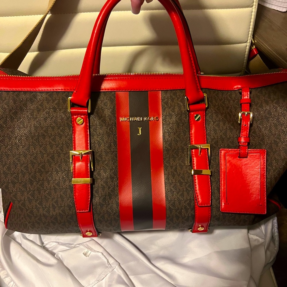 Large, Michael Kors duffel bag with engraved “J”